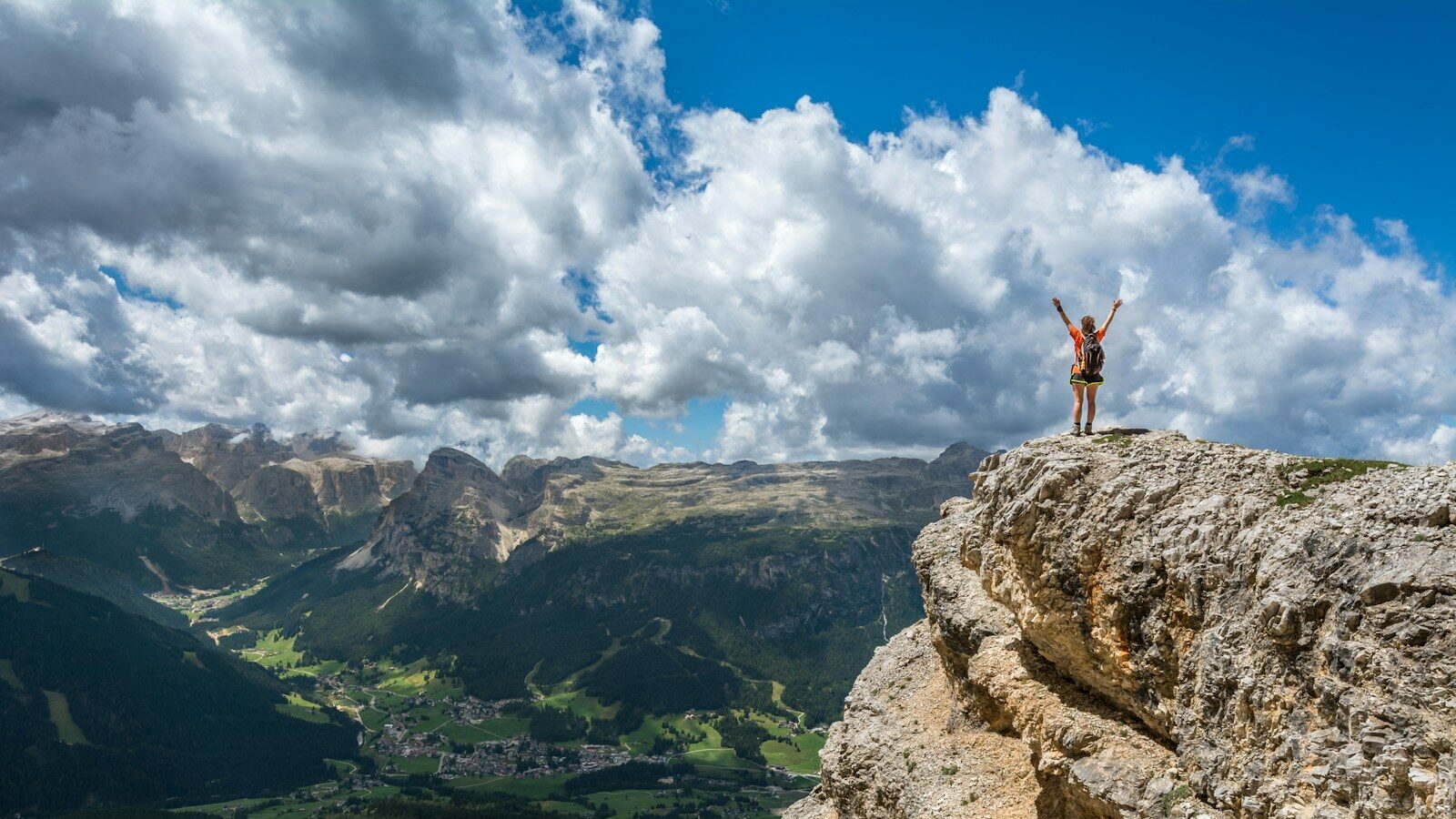 woman standing on mountain